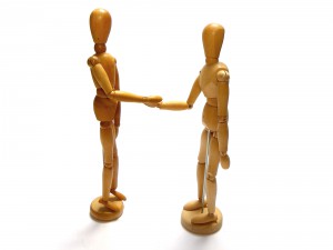 characters16 300x225 - Two Characters Shaking Hands