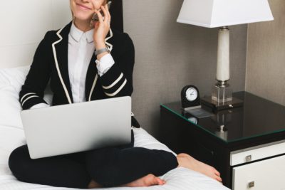 woman with laptop in hotel 4460x4460 e1547901879874 - What's With All The Guest Posts, Dave (Update on Our Site and Offers)?